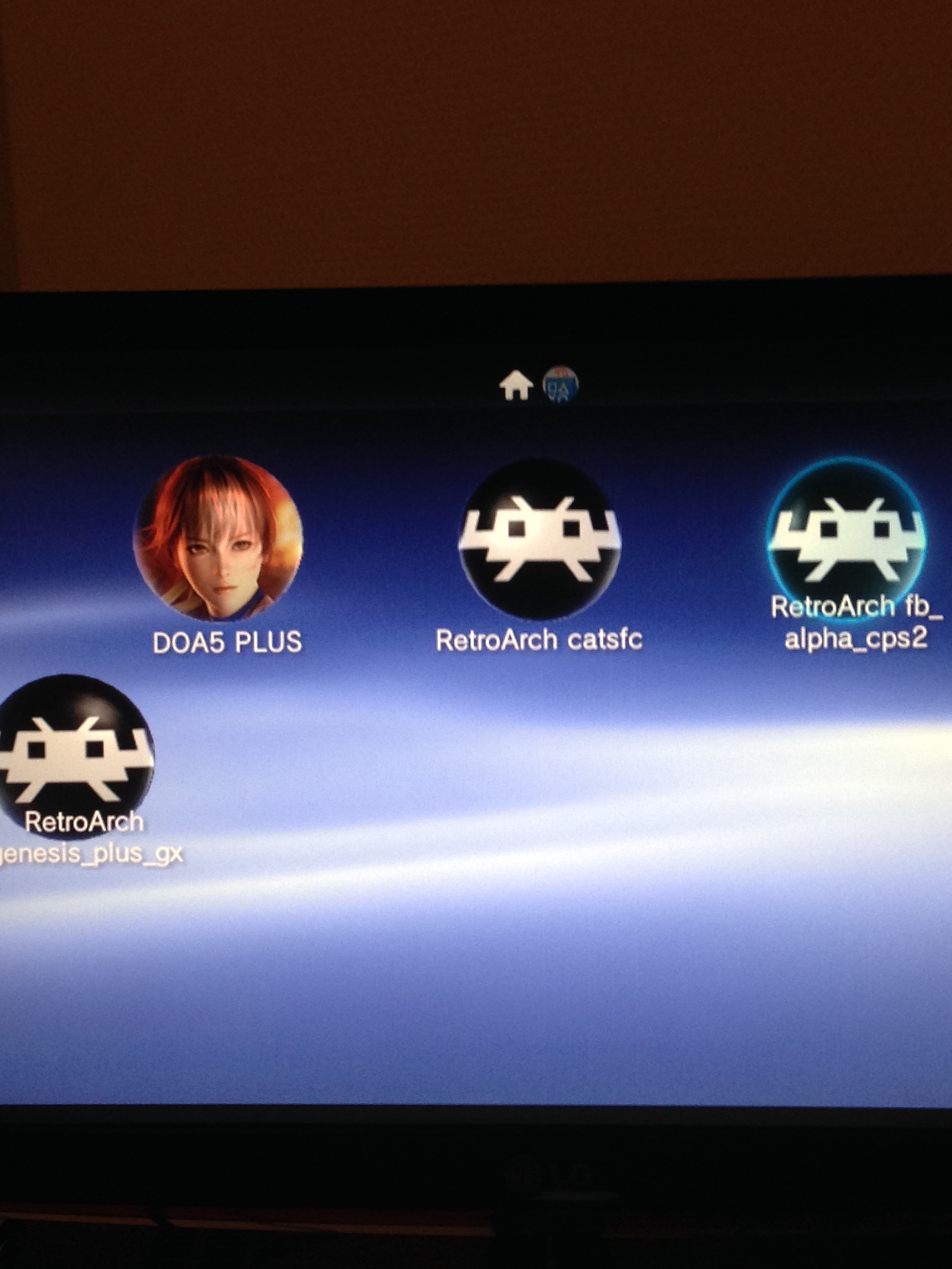 RetroArch appearing on the PS Vita Live Area homepage. Screenshot was taken on a PS TV.